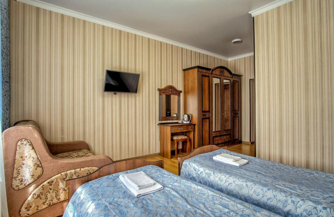 Отель Кавказ в Архызе, номер 2 местный 1 комнатный Стандарт (1,2,3 этажи). Фото 3