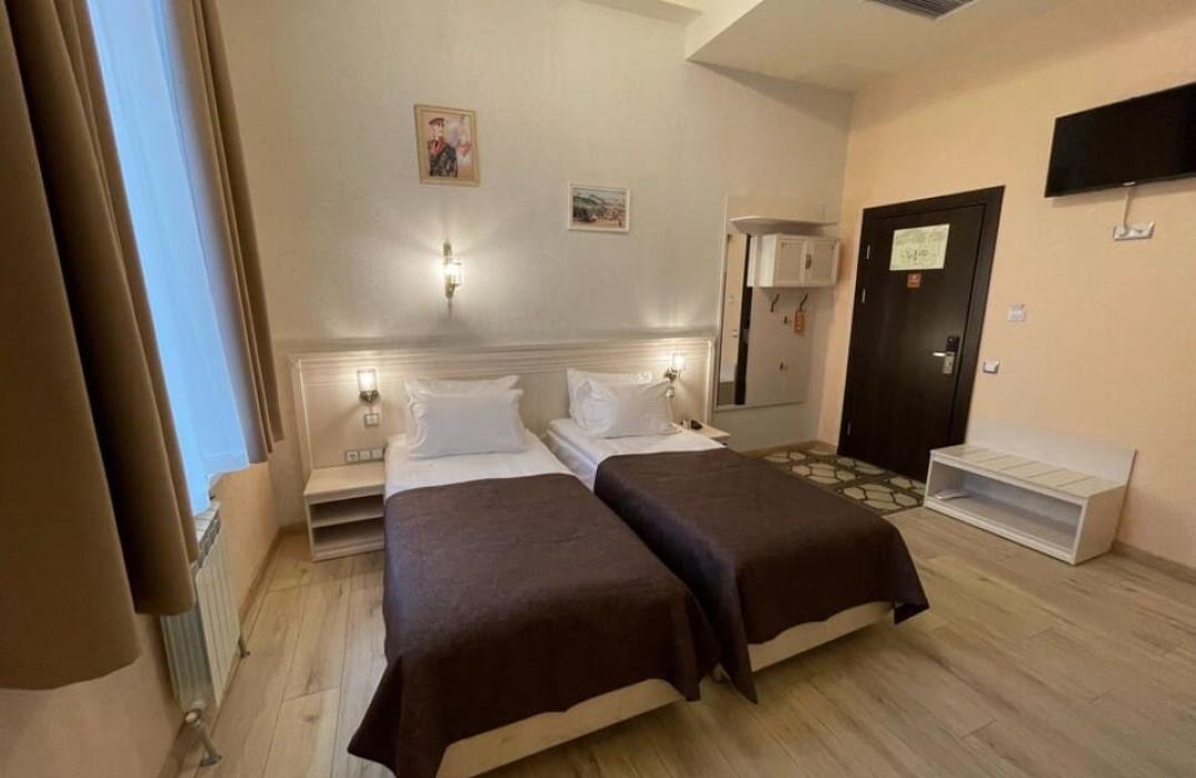 Отель Печоринн, номер Делюкс с двумя отдельными кроватями. Фото 1