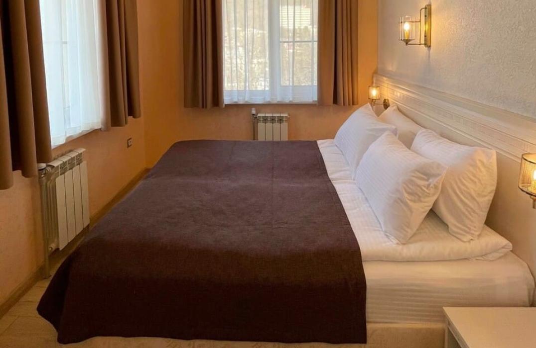 Отель Печоринн, номер Улучшенный двухместный с одной кроватью. Фото 3