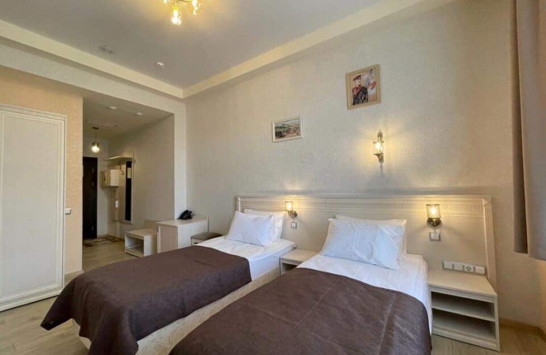 Отель Печоринн, номер Улучшенный двухместный с двумя отдельными кроватями. Фото 2