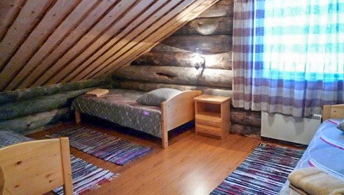 Спальная комната в коттедже Сказка загородного клуба Малая Медвежка в Карелии
